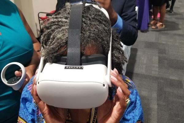 Attendee utilizing virtual reality 
